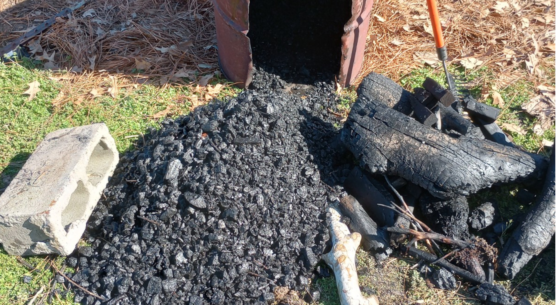 We create biochar as time and weather permit: raw wood is converted to coals, then mixed with compost or compost tea to make an amazing soil amendment.